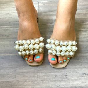 Beige pearl Miu Miu look alike slides.